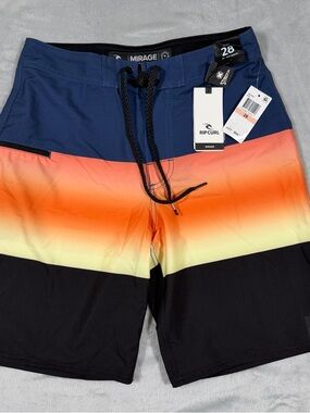 Rip Curl Men’s Mirage Gradient Block Boardshorts in Navy/Orange/Yellow/Black